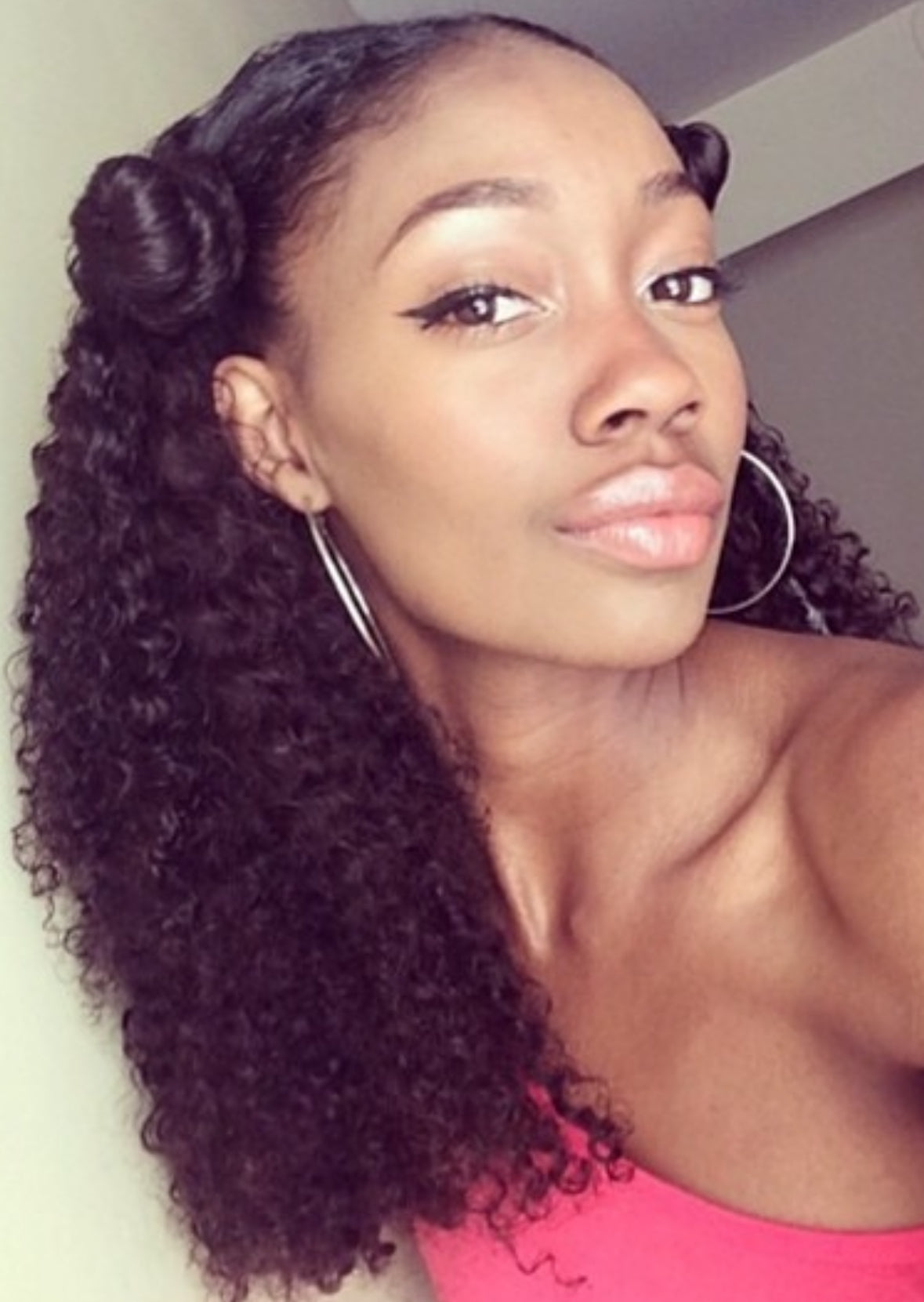 model wearing Mongolian Curly kinky hair extension for curly hair