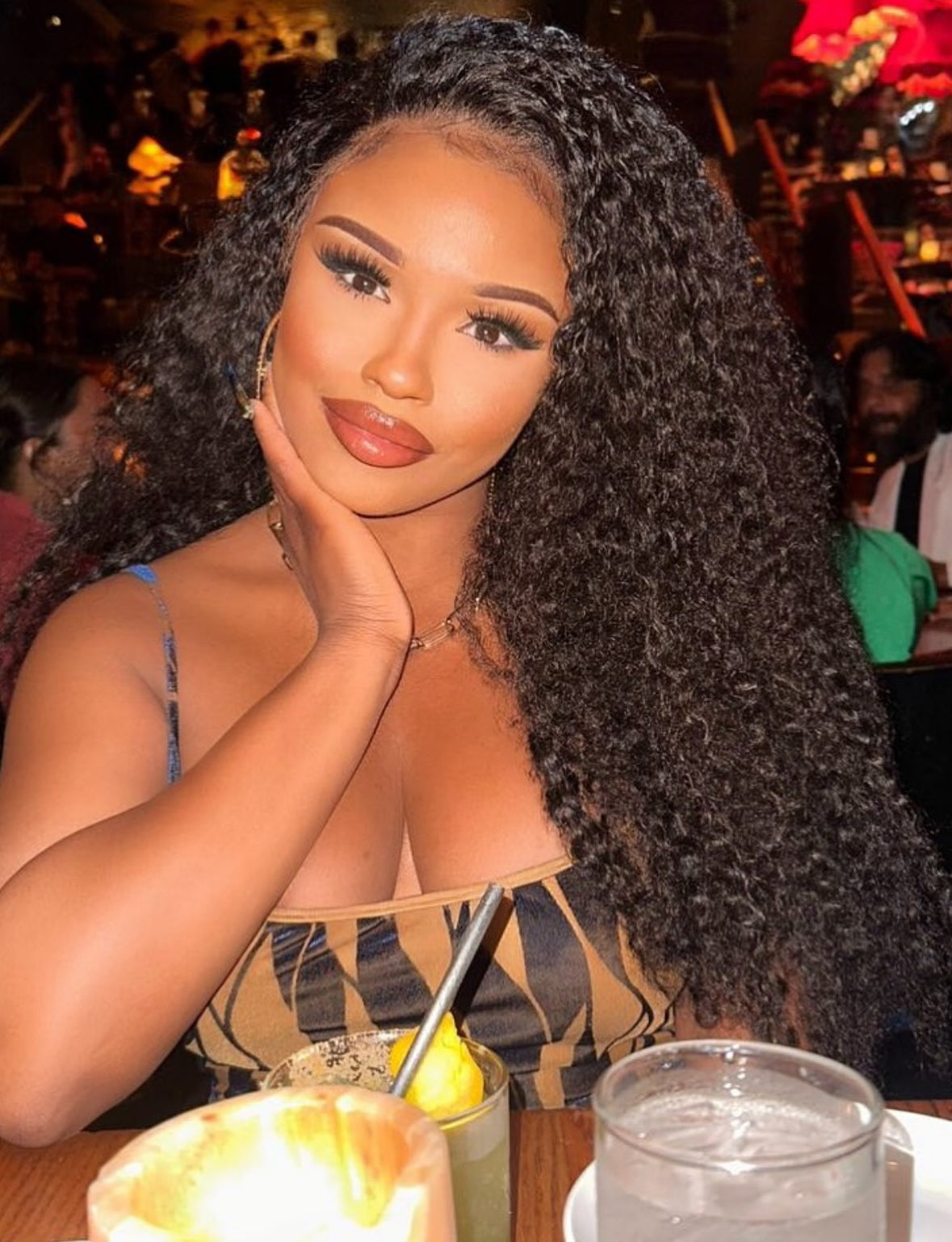 model wearing kinky curly wig
