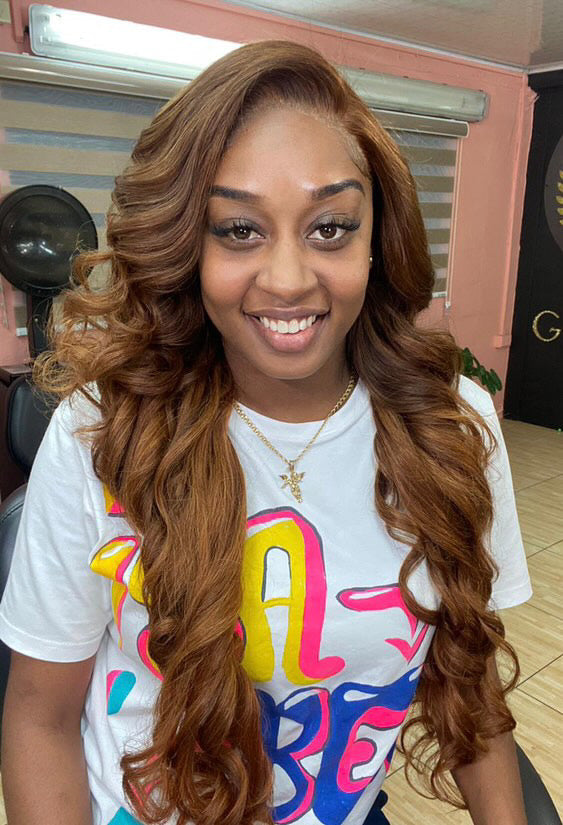 model wearing brazilian wavy virgin bundles